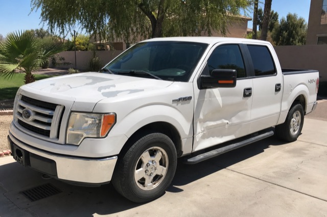 2013 Ford F-150 XLT — dented door, peeling paint
